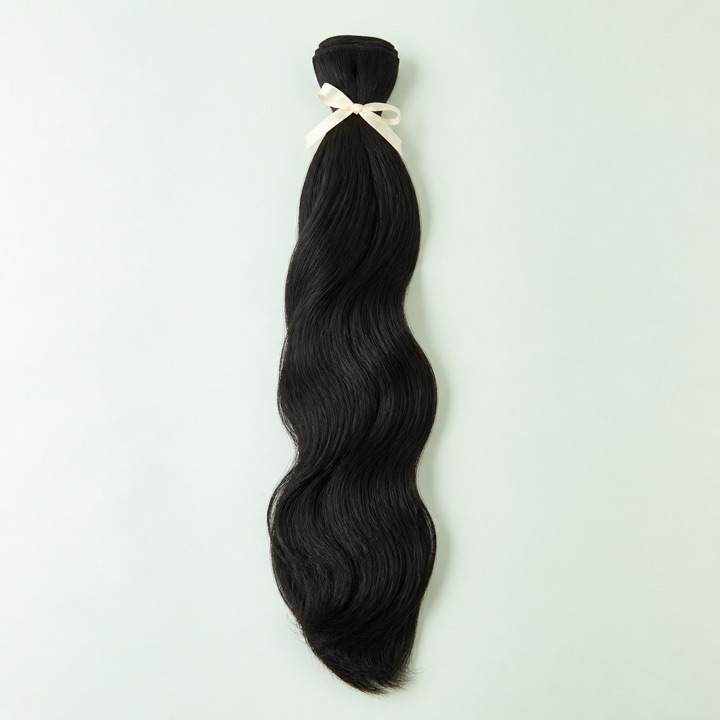 Mèche noire ondulée